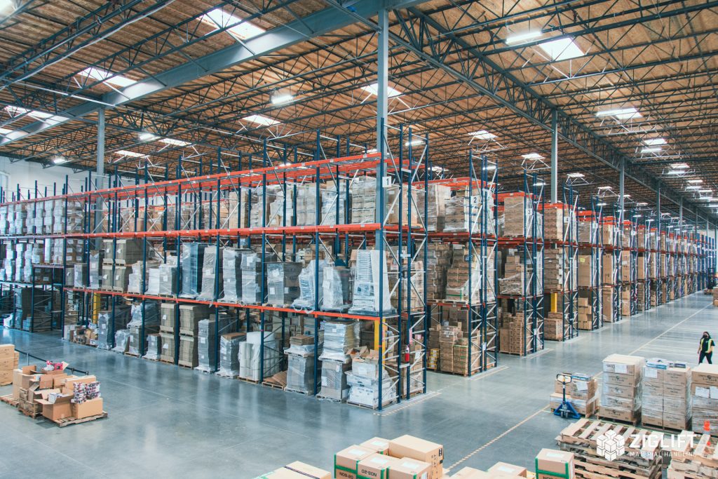 Rows of industrial pallet racks loaded with pallets in an Indianapolis warehouse
